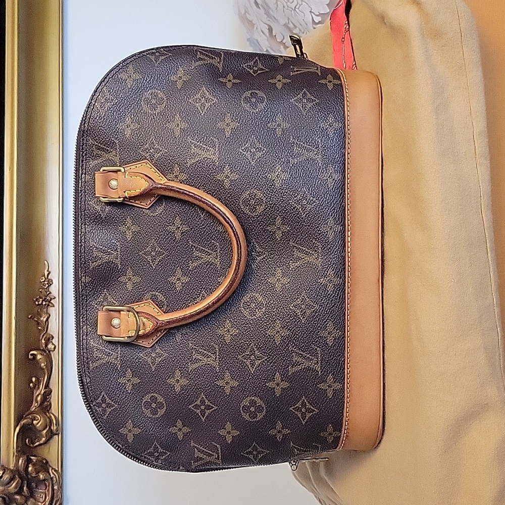 LOUIS VUITTON Alma monogram - Picture 14 of 16